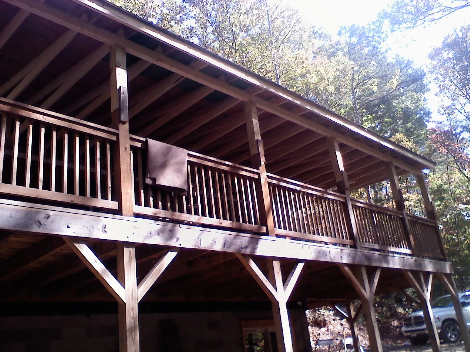 Timber framing under a new elevated porch and deck — Roof Leak Repair in Union City by Roofing Brothers